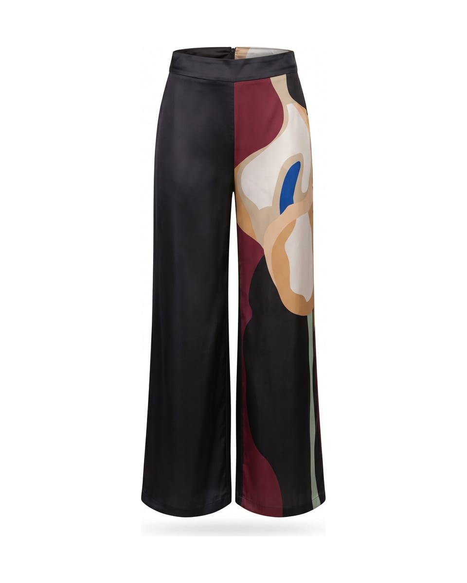 Ensemble asymétrique, imprimé abstrait, pantalon seul sur fond blanc